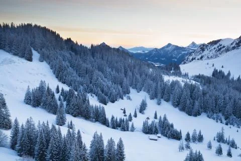Winter mountains in dusk Stock Photos