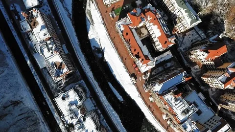 Winter in the mountains. Mountain river flows in the valley. Rosa Khutor Vidéo 100160291