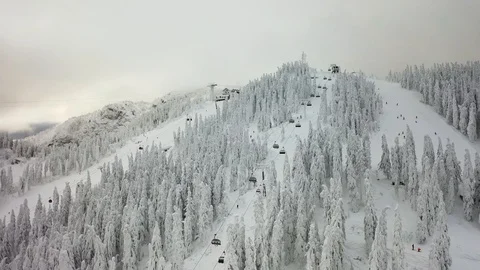 Winter mountains panorama with ski slopes and ski lifts Stock Footage 104832267