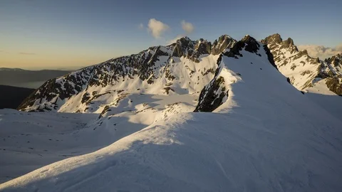Winter mountains ridge at sunset Stock Footage 122936439