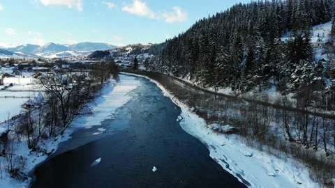 Winter on mountains river Nature 4k Snovy mountain house  Video stock 221813796
