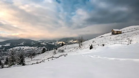Winter mountains snow sunset Timelapse Mountain house - moving clouds background Stock Footage 211405200