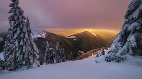 Winter mountains time lapse of clouds motion fast in snowy forest sunrise nature Stock Footage 167263663