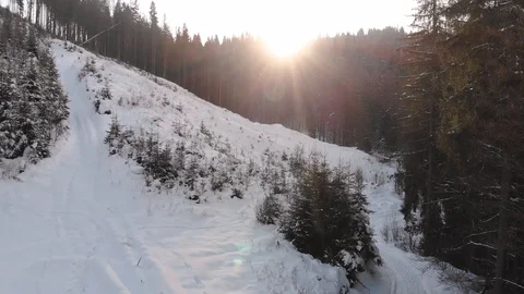 Winter in the mountains. Winter forest from a bird's eye view. Snow-covered Stock Footage 101874791