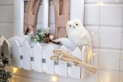 Winter New Year's decorations with white toy owl Stock Photos