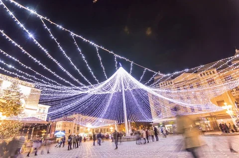 Winter night scenery city square with Christmas tree and holiday market Stock Footage 83482671