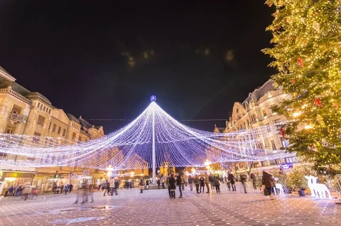 Winter night scenery city square with Christmas tree and holiday market Stock Footage 83482848