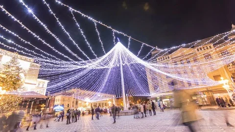 Winter night scenery city square with Christmas tree and holiday market Stock Footage 83621609