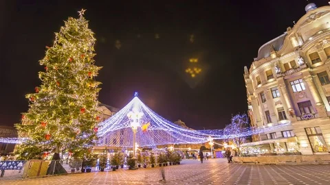Winter night scenery city square with Christmas tree and holiday market Stock Footage 83621664