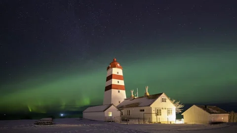 Winter northern lights with lighthouse Stock Footage 250420133