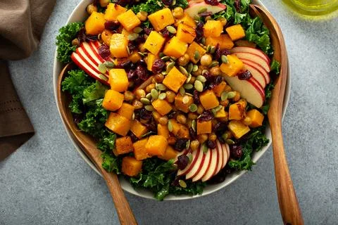 Winter or fall salad with kale and butternut squash Stock Photos