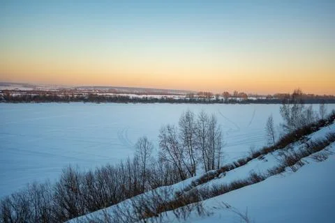 Winter orange sunset in forest over river Tom near Kemerovo, Siberia, Russia Stock Photos