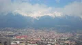 Winter panorama of beautiful European city and mountains covered with snow 4k or 4k+ Resolution