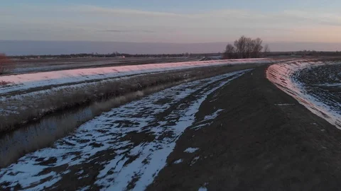 Winter panorama of field during sunset shot from above Stock Footage 89931597