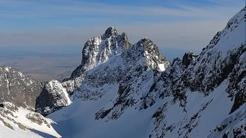 Winter panorama of mountains above the clouds. View of the High Tatras Stock Footage 160122330