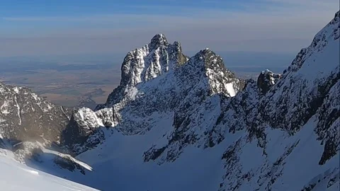 Winter panorama of mountains above the clouds. View of the High Tatras Stock Footage 160122349