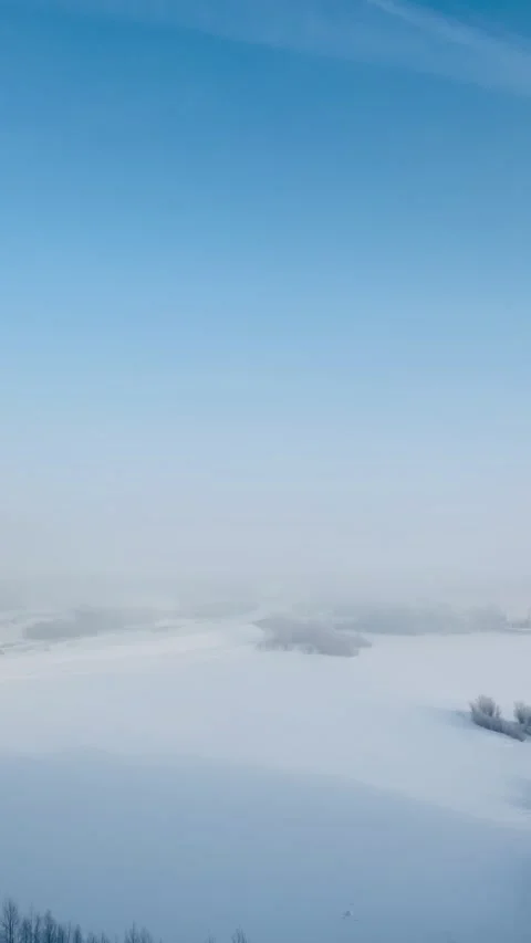 Winter panoramic view to frozen river Ob and snowy city in Siberia Stock Footage 212478919