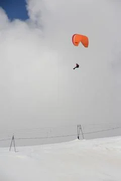 Winter paragliding Stock Photos