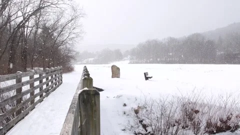 Winter park bench snow storm cinematic look Stock Footage 262379644