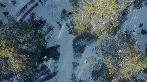Winter park. Top-down view of people walking along paths in winter. Outdoor walk Stock Footage 171289292