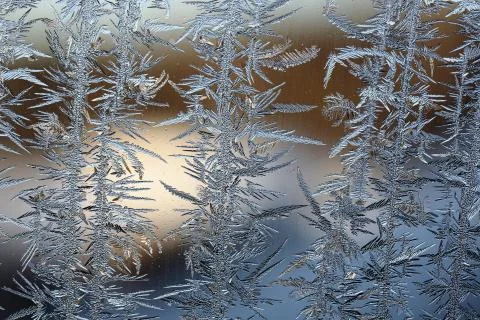 Winter pattern of ice crystals on glass Stock Photos
