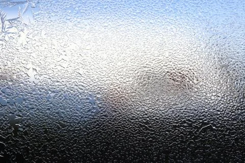 Winter pattern of ice crystals on glass Stock Photos