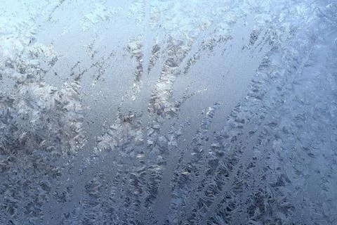 Winter pattern of ice crystals on glass Stock Photos