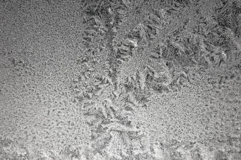 Winter pattern of ice crystals on glass Stock Photos