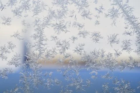 Winter pattern of ice crystals on glass Stock Photos