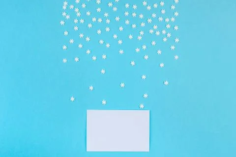 Winter pattern made of small white snowflakes Stock Photos