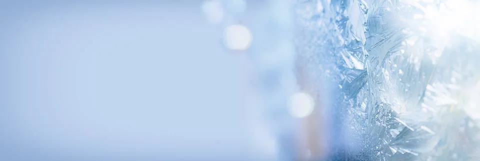 Winter patterns festive ice background Abstract background with Christmas lights Stock Photos