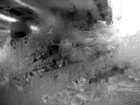 Winter patterns on the glass closeup Stock Photos