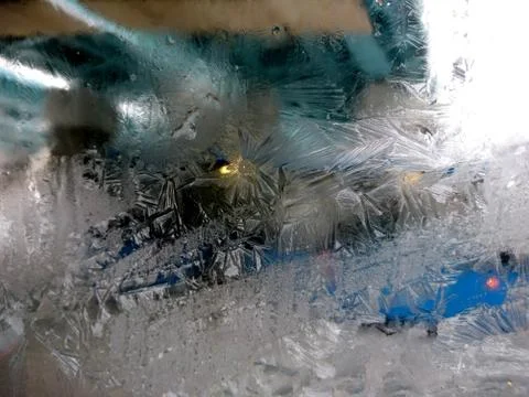 Winter patterns on the glass closeup Stock Photos