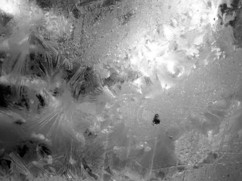 Winter patterns on the glass closeup Stock Photos