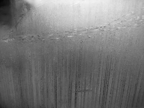 Winter patterns on the glass closeup Stock Photos