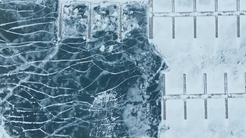 Winter Patterns Over Icy Bronte Harbour and Lake Ontario by Drone 스톡 동영상 331167560