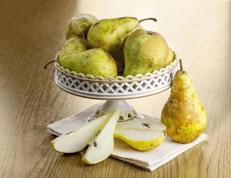 Winter pear on a plate Stock Photos