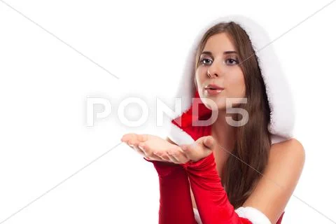Winter, people, happiness concept - happy woman in red santa helper hat Stock Photos
