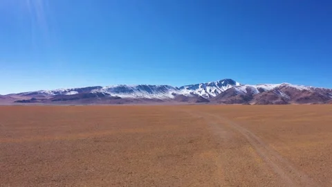 Winter plateau, snow mountains, distant snow mountains Stock Footage 241964152