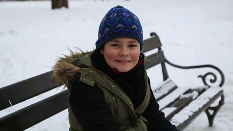 Winter portrait of kid boy smiling at the outdoors Stock Footage 72367043