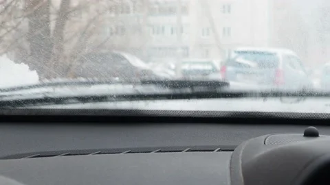 Winter problems of car drivers. Machine, covered with snow Stock Footage 146111352