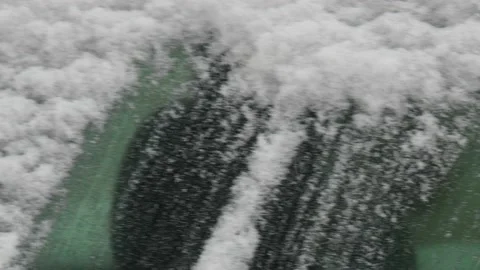 Winter problems of car drivers. Machine, covered with snow Stock Footage 146111451