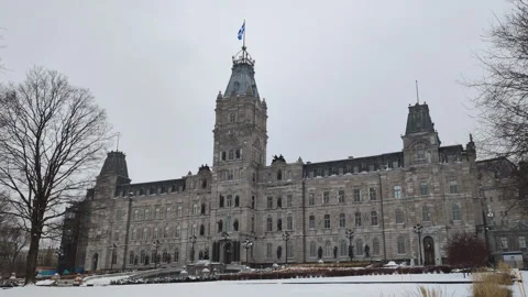 In winter, the Quebec parliament building during a snowstorm Vídeos de archivo 341857693