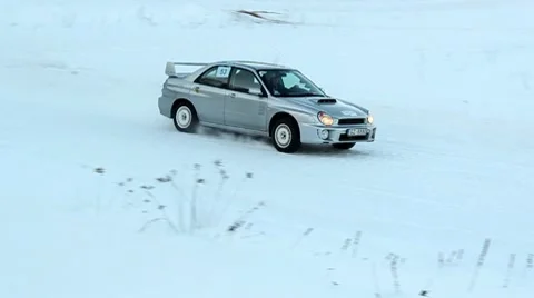 Winter racing Subaru DNxHD Stock Footage 10737107