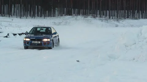Winter rally car going by ProRes Stock Footage 10720247