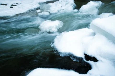 Winter rapids in a small river Stock Photos