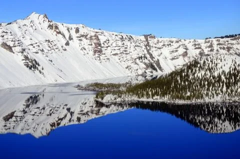 Winter reflection in Crater Lake Stock Photos