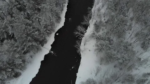 Winter River 4K 23.97 [Aerial Bird's Eye View] Stock Footage
