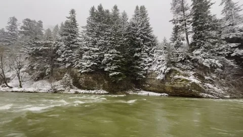Winter river and forest in the mountains. snowy forest and mountain river Stock Footage 267876961