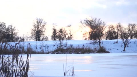 Winter river covered with ice and snow Stock Footage 146779216